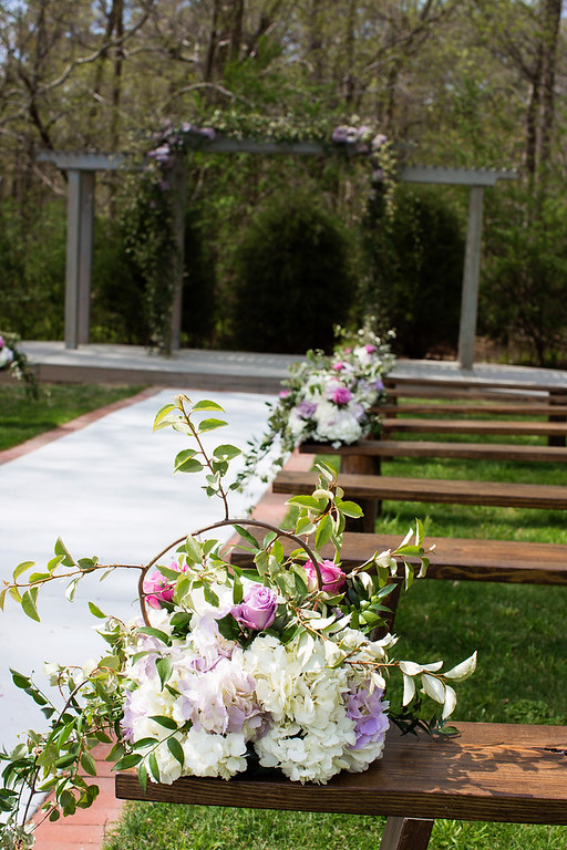 Timeless Love NC Weddings Raleigh Wedding planner shades of purple rustic elegant wedding - Ceremony aisle markers