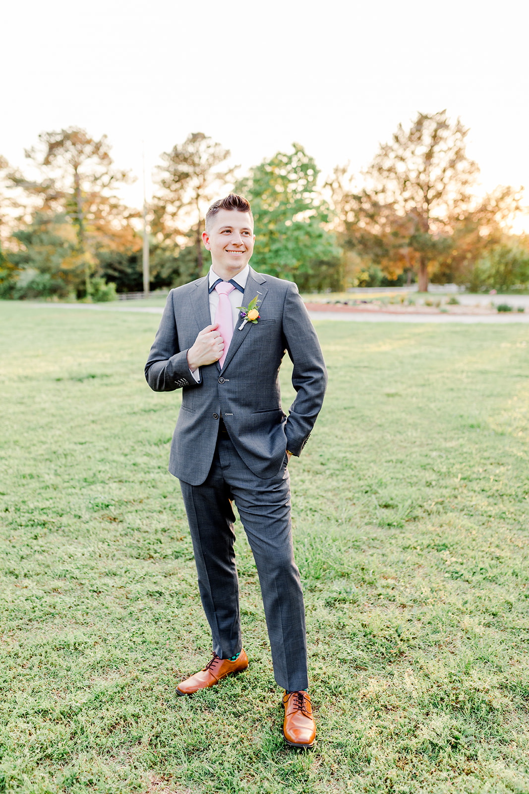 Bright + Cheerful Garden Elegance of Artmosphere — groom in SF tailors custom grey suit