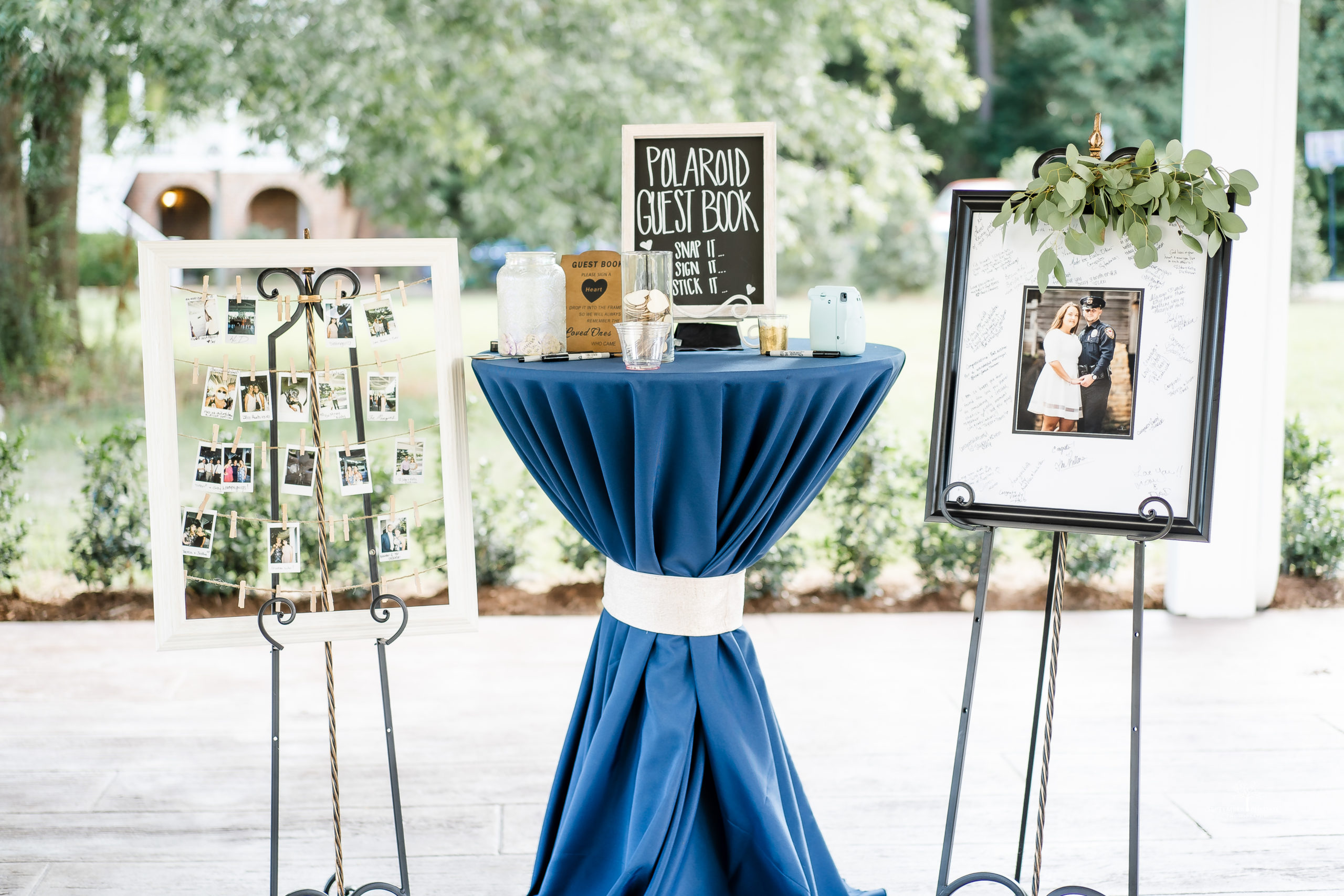 Décor details of Samantha and Johnathan's Blush, Navy, and gold wedding at Walnut Hill.