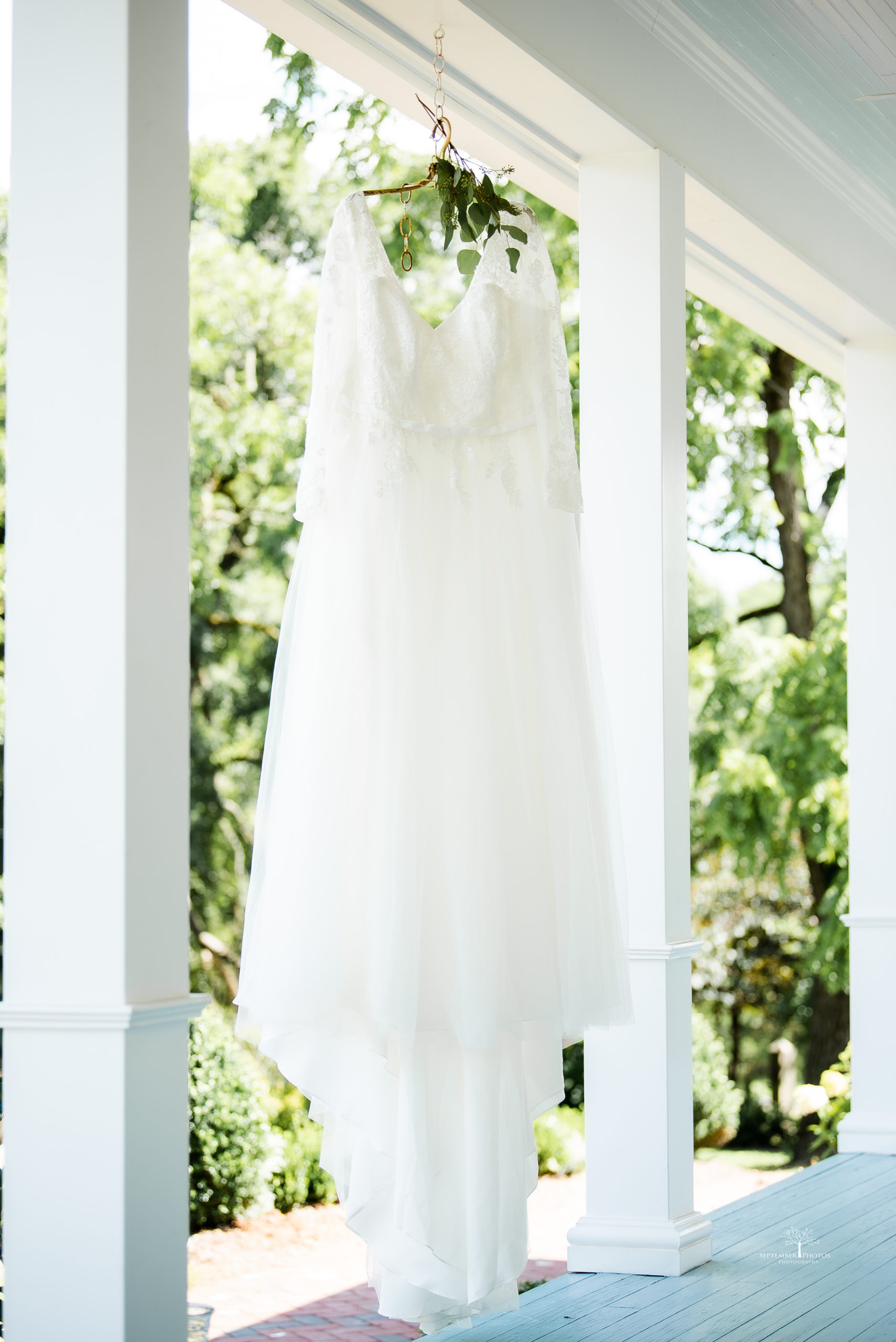 Samantha beautiful gown for her Blush, navy, and gold wedding at Walnut Hill.
